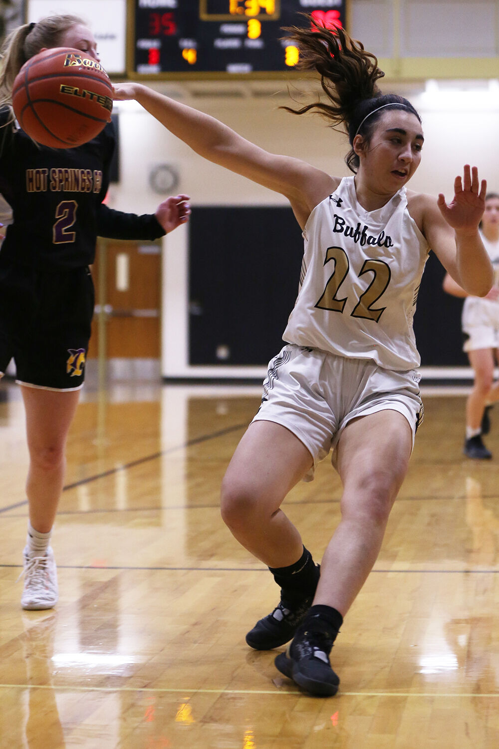 Cantrell Rosalez passes the ball to a teammate